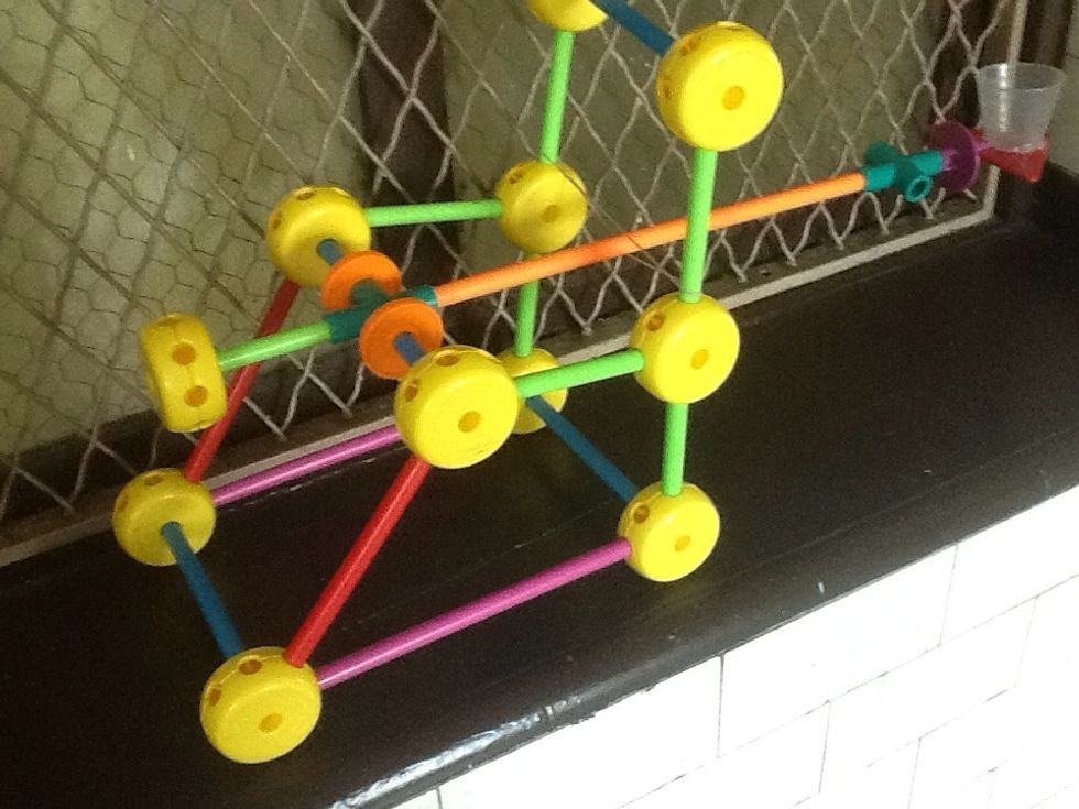 Step 6: Once you add the rubber band and cup, it should look like this.