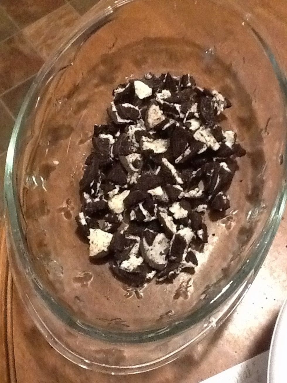 Step 6- put 1/4 of crushed cookies at the bottom of a glass bowl