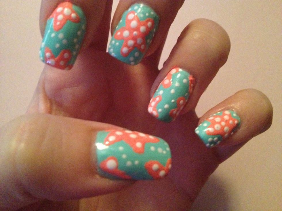 Step 6: Use dotting tool and white nail polish to create different bubble patterns on nails