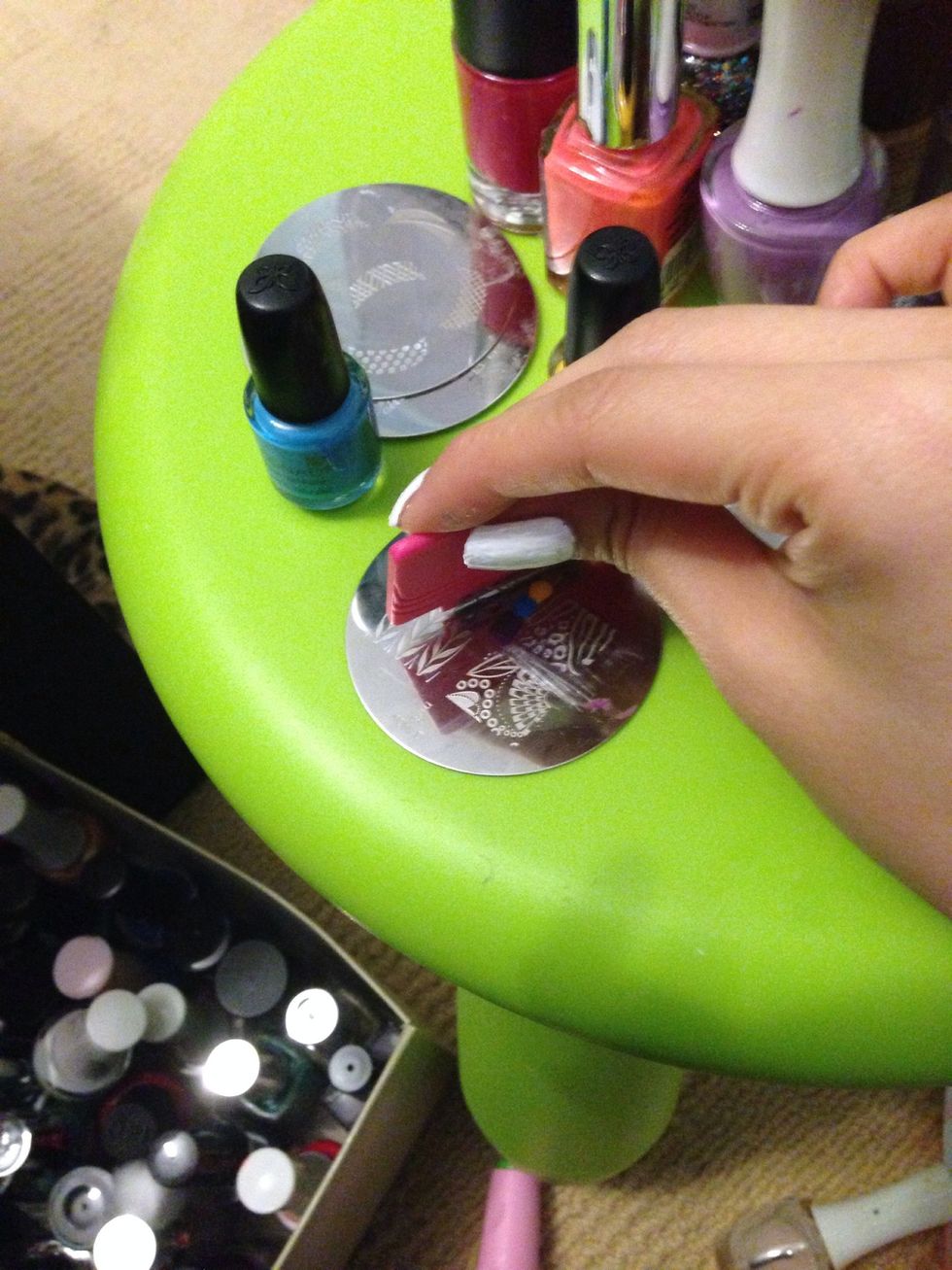 Step 6: use your scraper to drag and spread the colours on to the design