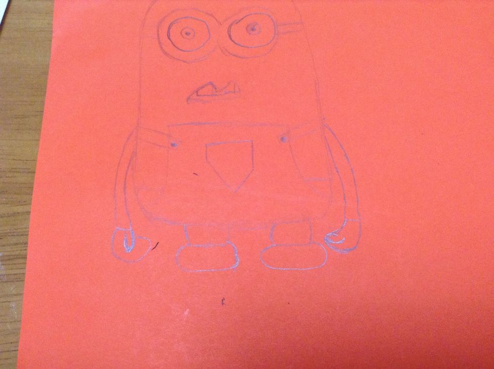 Step 7. Draw arms starting beside of overalls and reaching the feet.