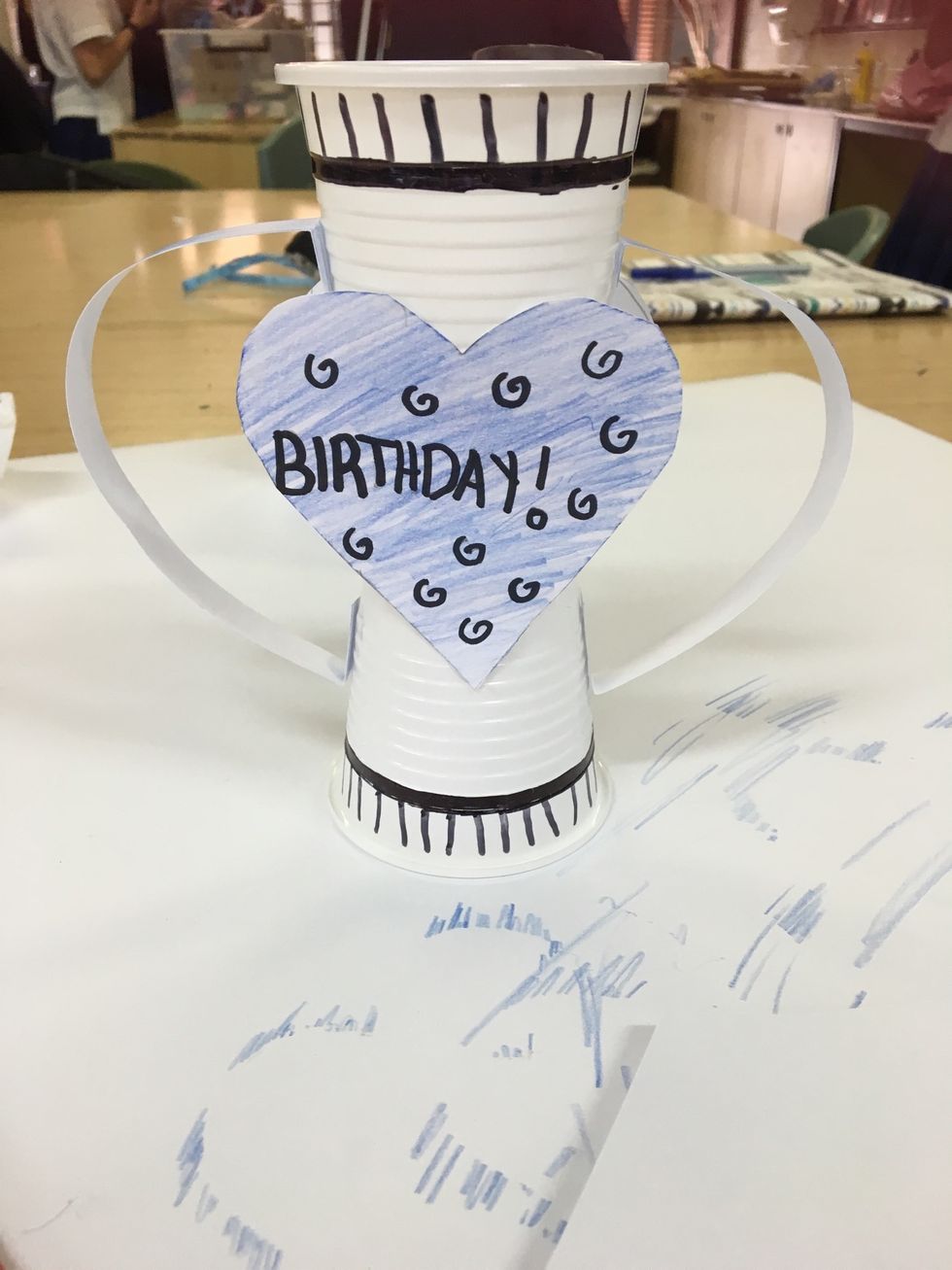 Step 7- Once you have done that, glue the strips of card board opposite to each other.