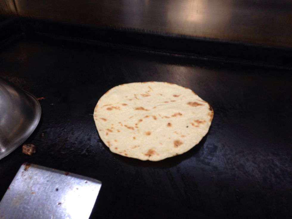 Step 7: When pita bread starts browning/ crisping, then remove from the grill.
