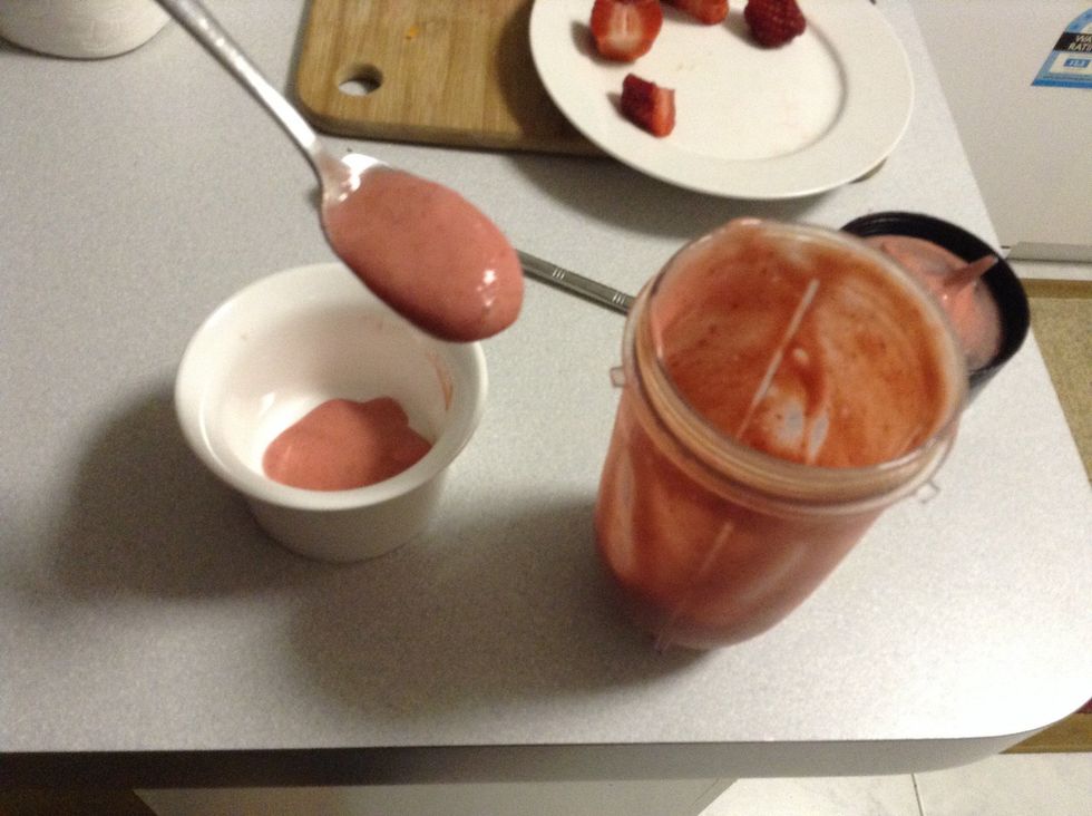 Step 7. When your banana and strawberry sorbet has become a very nice creamy texture start scooping it out of the blender and into your small bowl.
