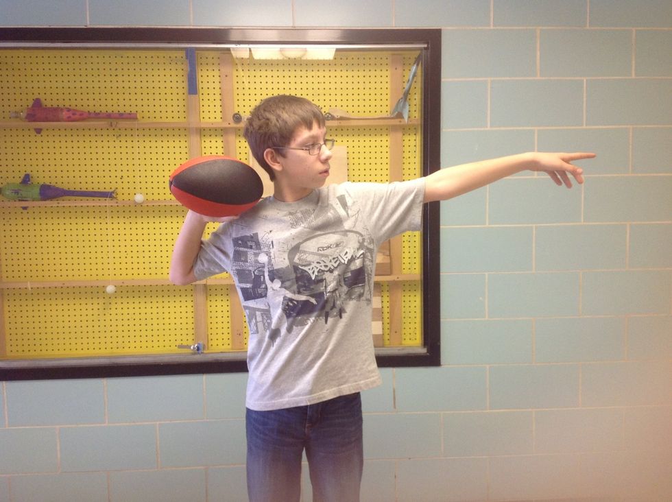 Step 7 With your non dominate hand make a guide by putting your arm straight in front of you and point your index finger.