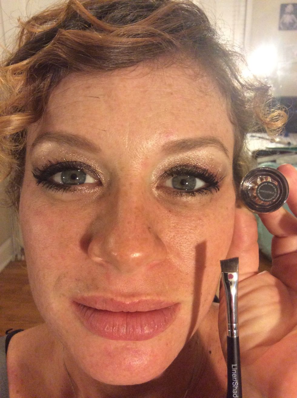Step 8: Fill in and shape your eyebrows with Younique's matte pigment Irresistible mixed with Younique's Rose Water