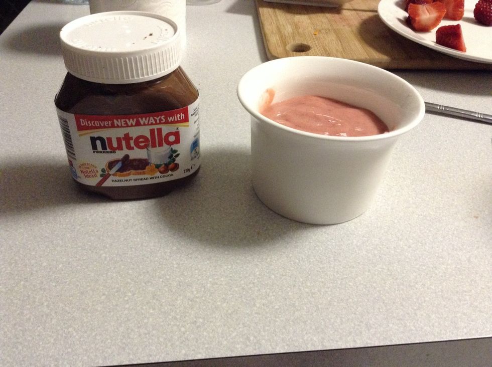 Step 8. Once you've scooped all the sorbet get some nutella or sweets of your choise and start decorationg your sorbet with them.