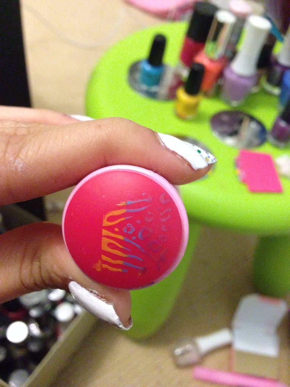 Step 8: Roll the end of the stamper over the design.