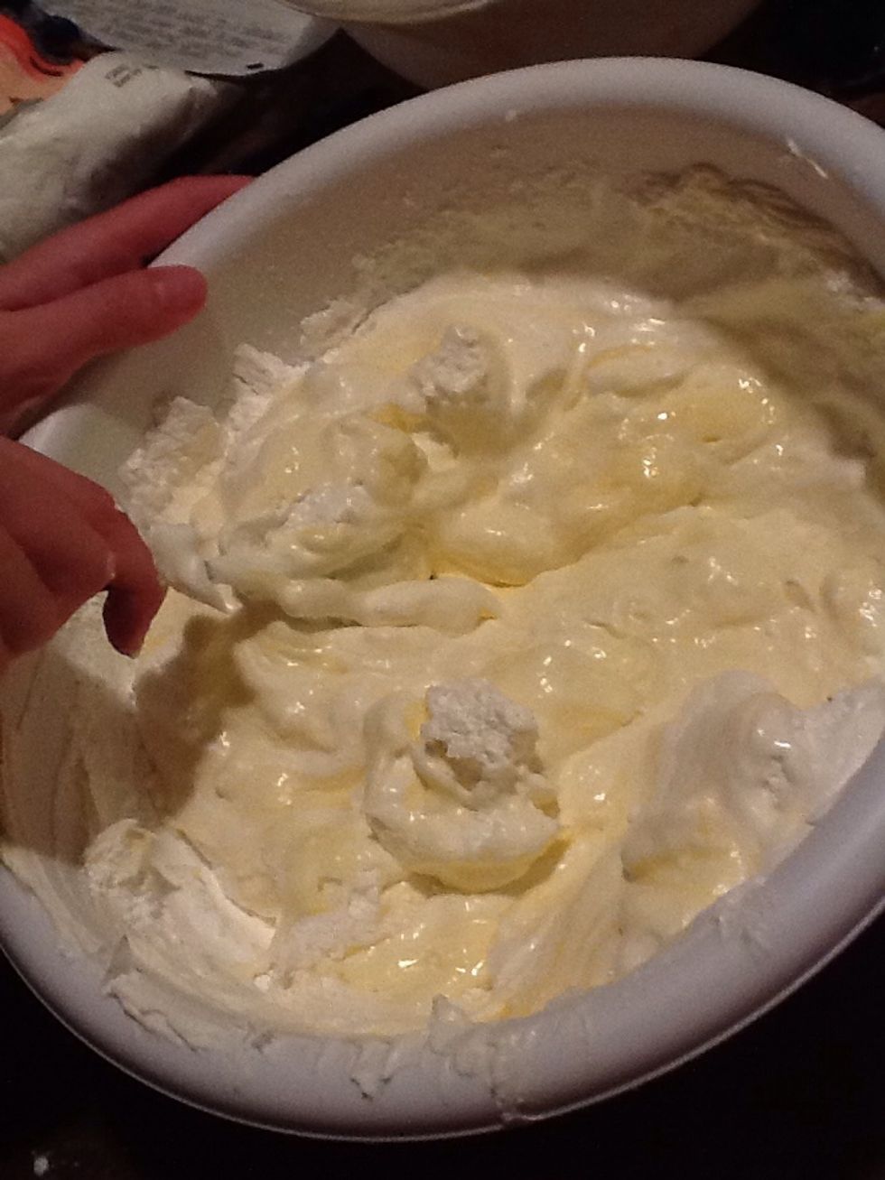 Step 9- add cream cheese, powdered sugar, and whipped topping to the pudding mixture.