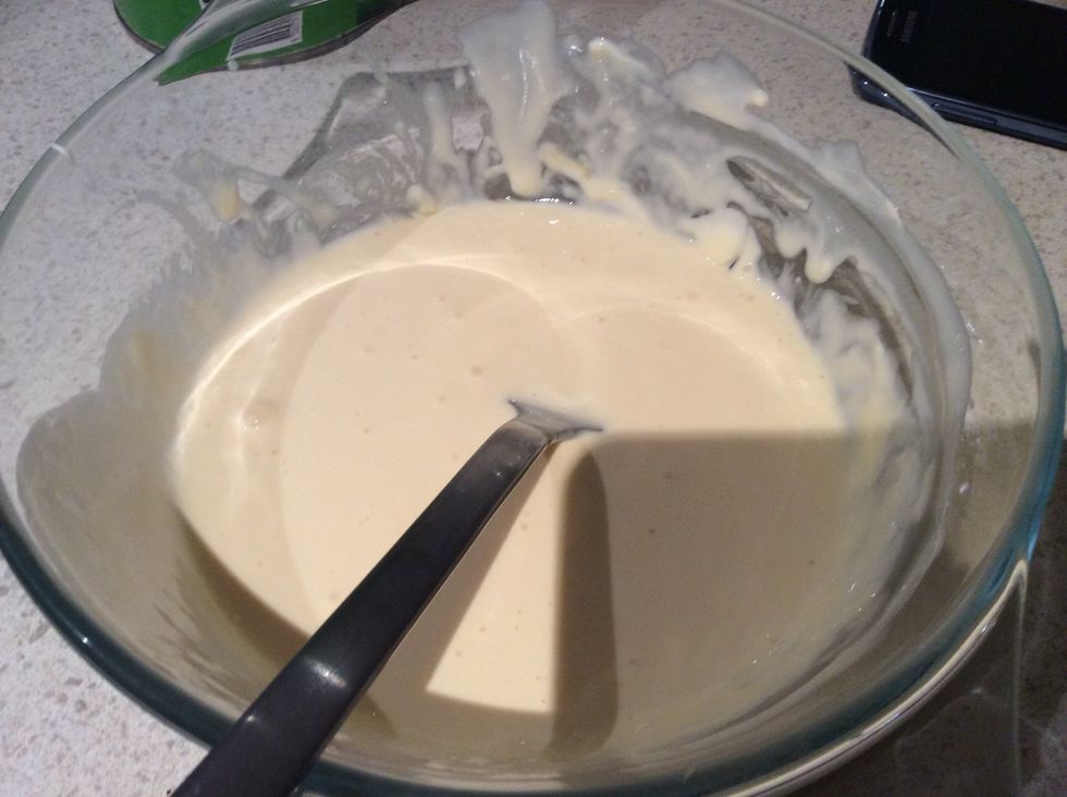 Step 9. Crack egg and add 150 grams of sour cream and mix together