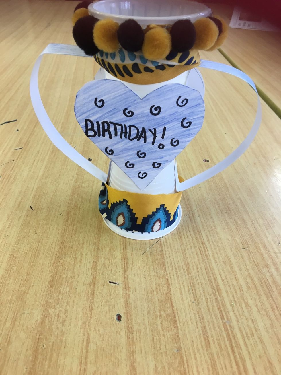 Step 9- To top it off glue some Pom poms to the top and enjoy!