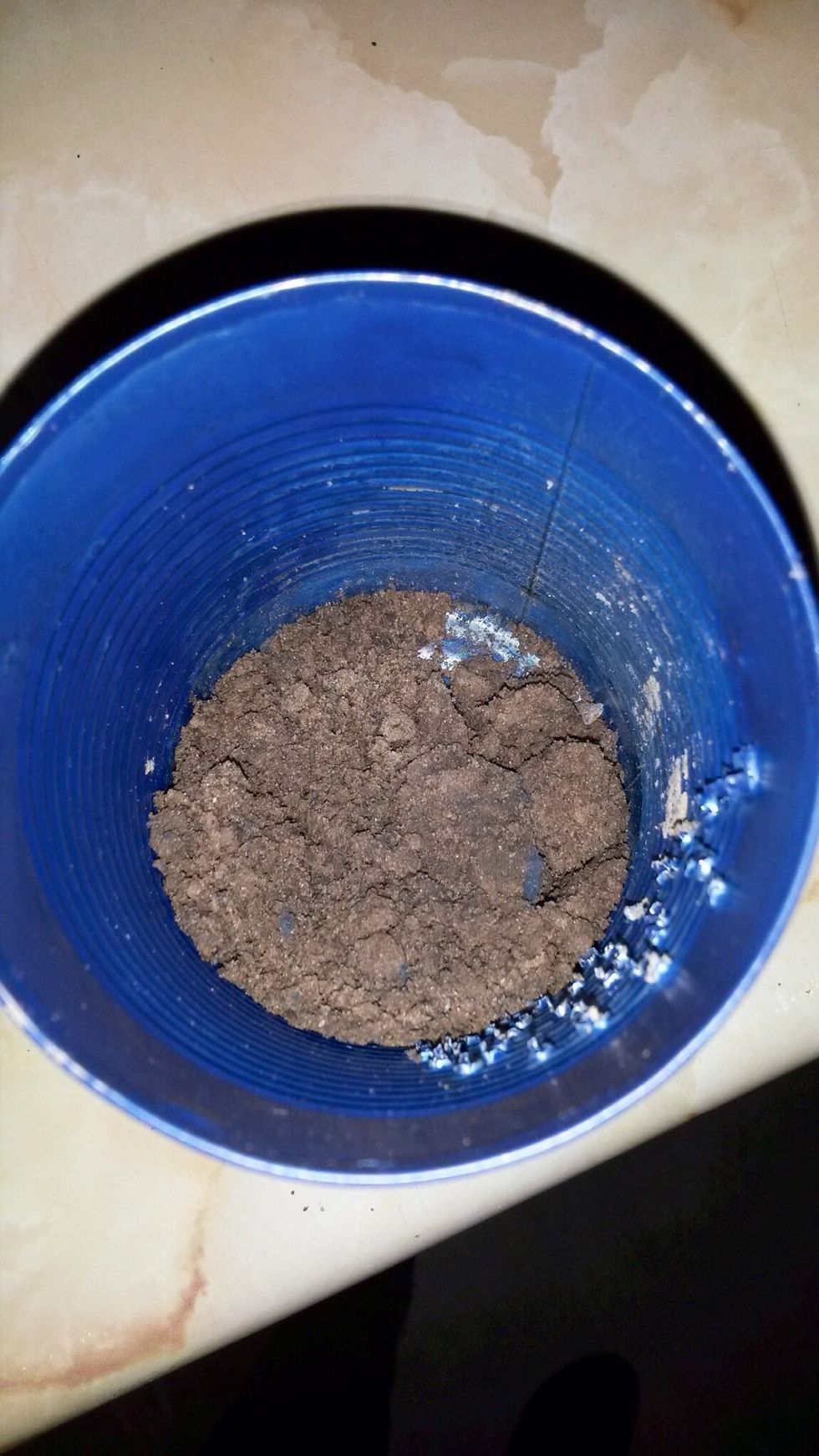 Step 9: When your can is done drying, fill it with sand until it reaches the bottom of your picture.