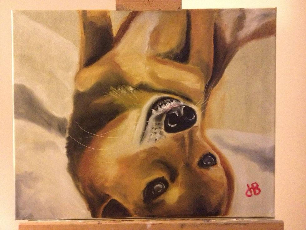 Step back and view from across the room. Adjust any last things as necessary. Add some red to your pinky and sign.