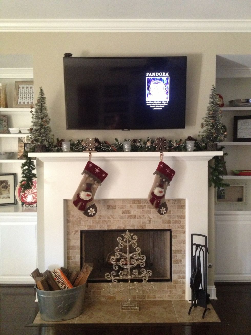 Step back, rearrange as you wish, and feel festive! I usually put our Christmas cards we receive behind the garland for the season! If you have additional space (not a tv) put a pretty quote or art.