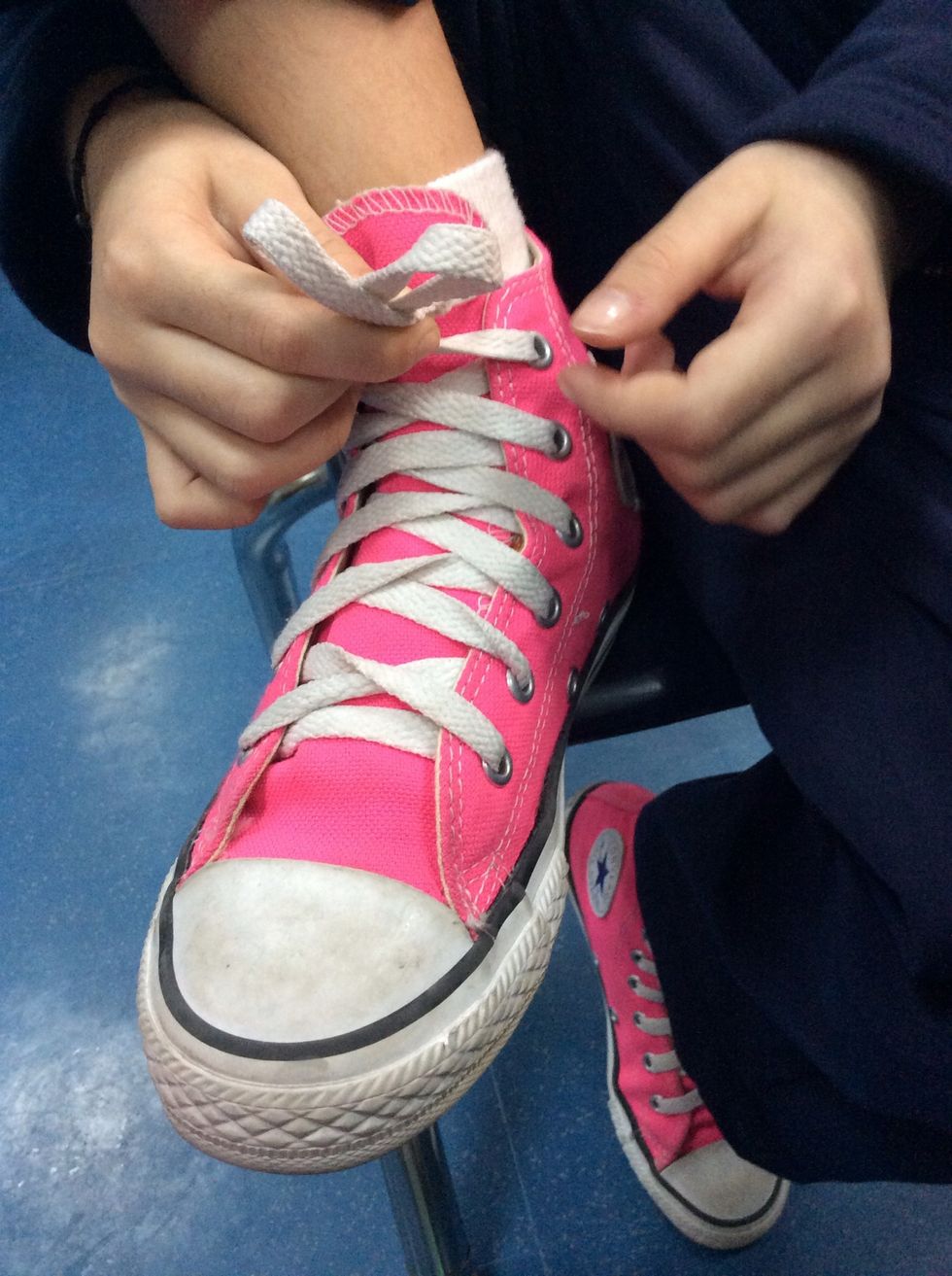 Step five, after that cross the bunny ears.