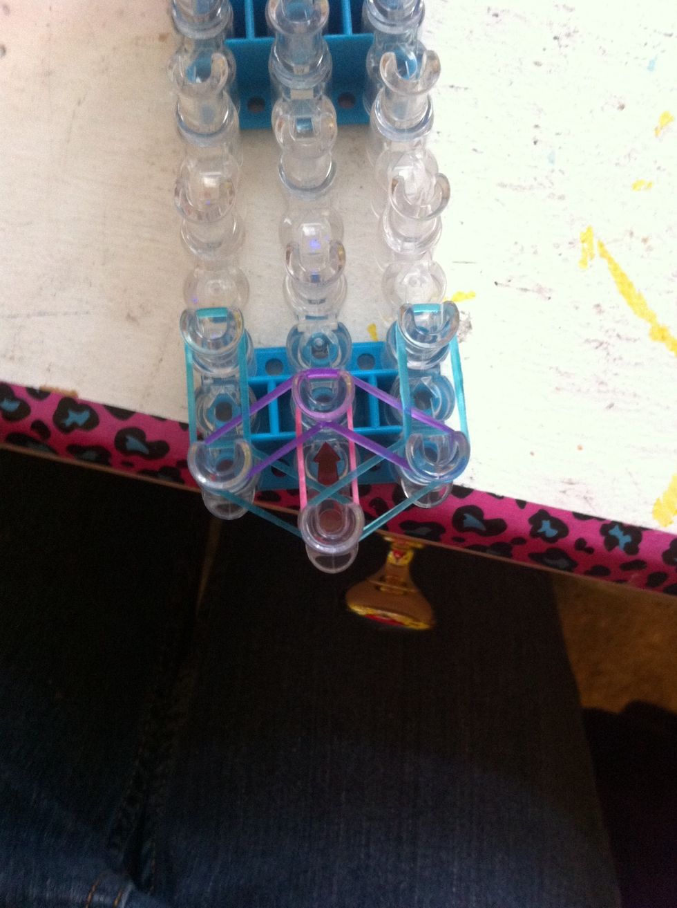 Step five- And place a purple here ( ignore the blue bands until next step)