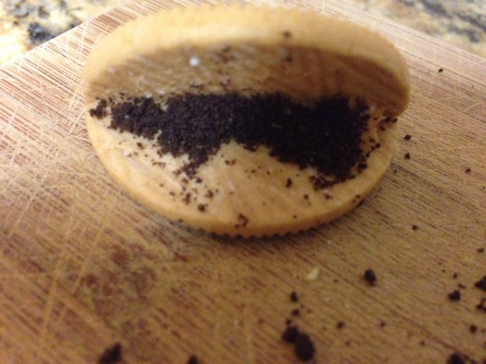 Step four: Get the regular Oreo crumbs and put it on top of the peanut butter