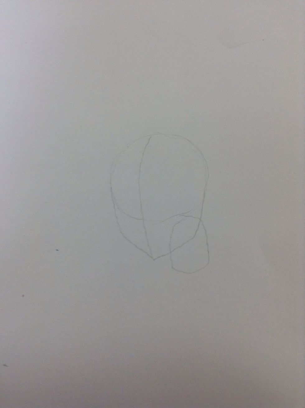Step four: lightly draw a cylinder shape under the head, to make the neck.