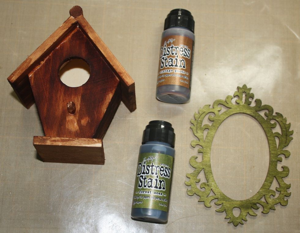 Step One: Stain  (or paint) birdhouse.  Tip:  I had to use a paint brush to get into the corners.  You can carefully remove the top of the Distressed Stain and then use a paint brush.