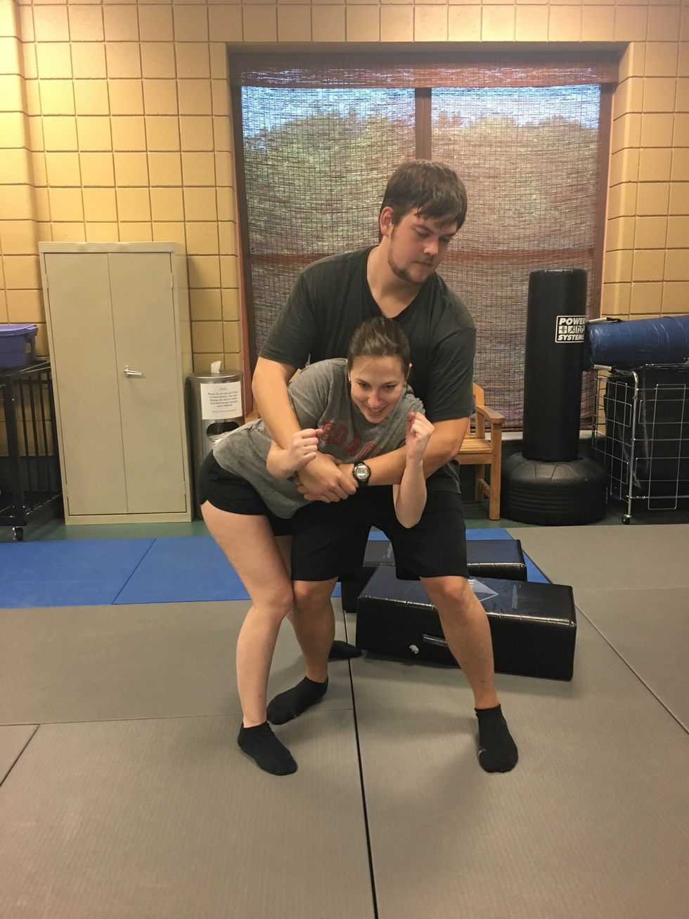 Step your inside leg behind the attacker's outside leg