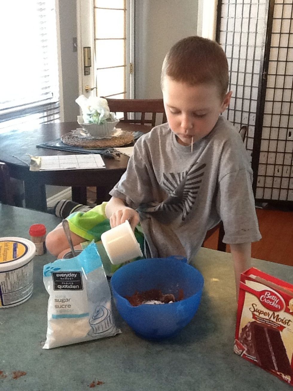 Step12. Add 1 cup of icing sugar. Toothpick in mouth for coolness.