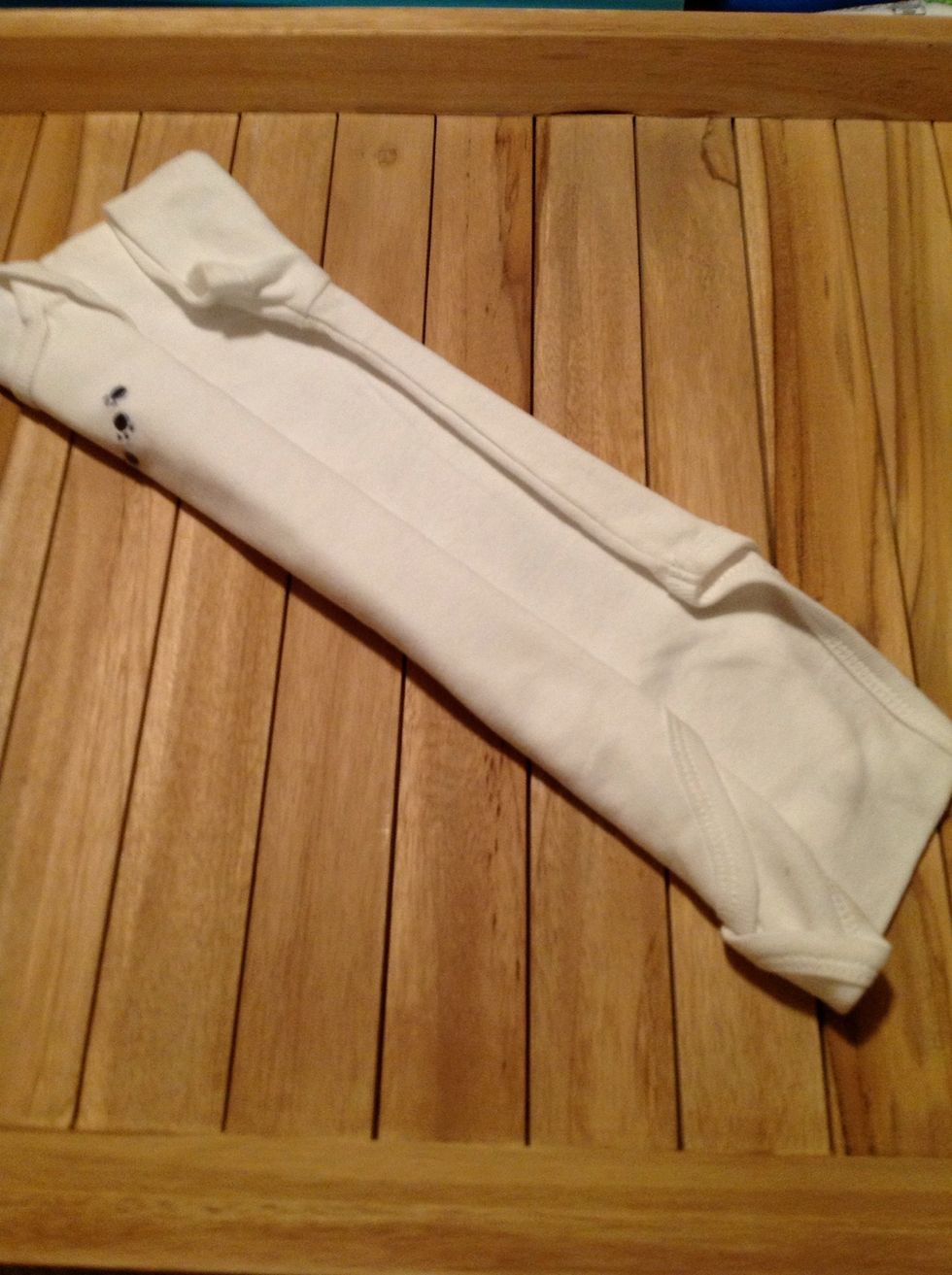 Step2: Fold the sides inward and keep flat as shown in the picture...