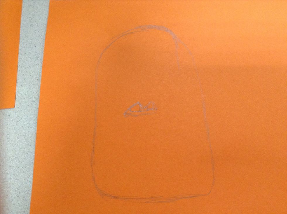 Step2. In the middle of the body draw a mouth which shows only upper teeth.