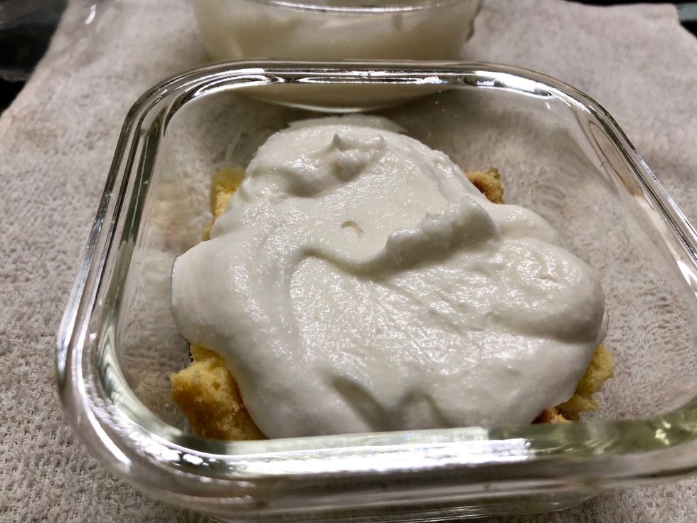 Step2 put the mixed ingredients on top of the fruit cake