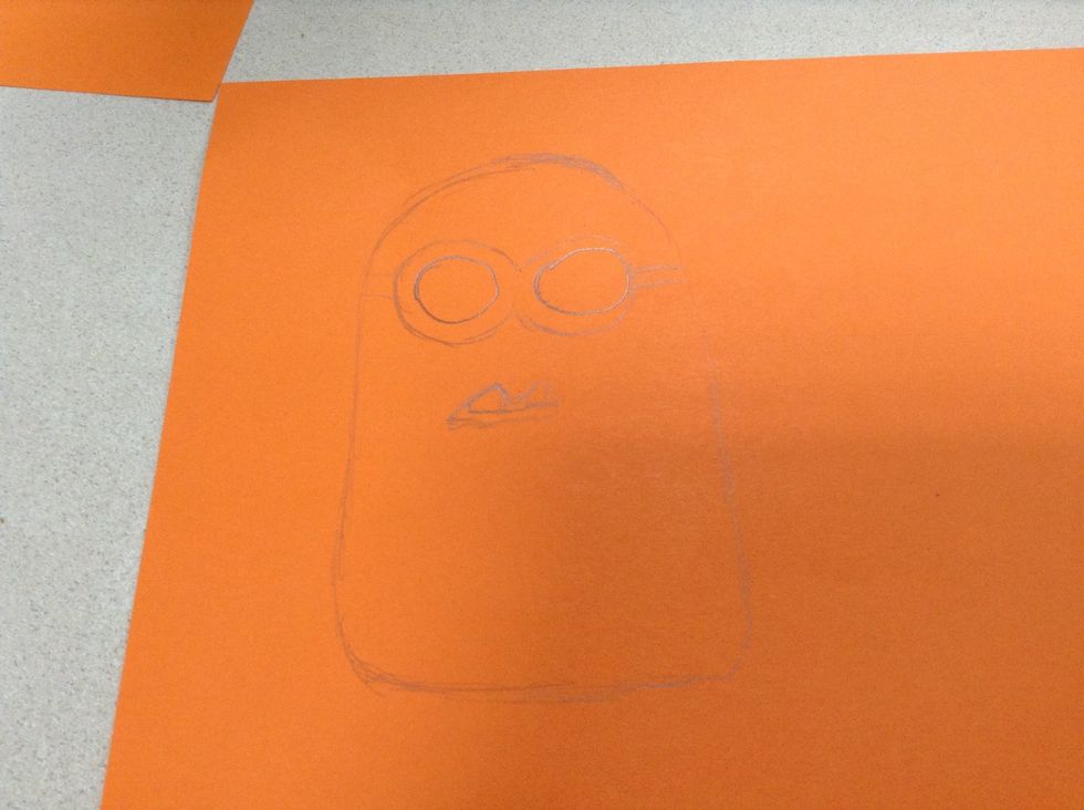Step3. In the middle of the upper part of the body, draw a big glasses.