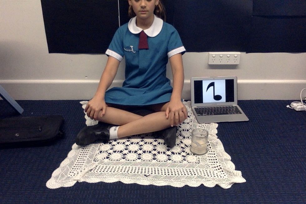 Step4 . Sit down and think of a happy place.