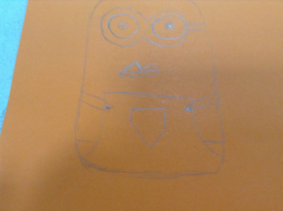 Step5. Draw overalls just below the mouth.