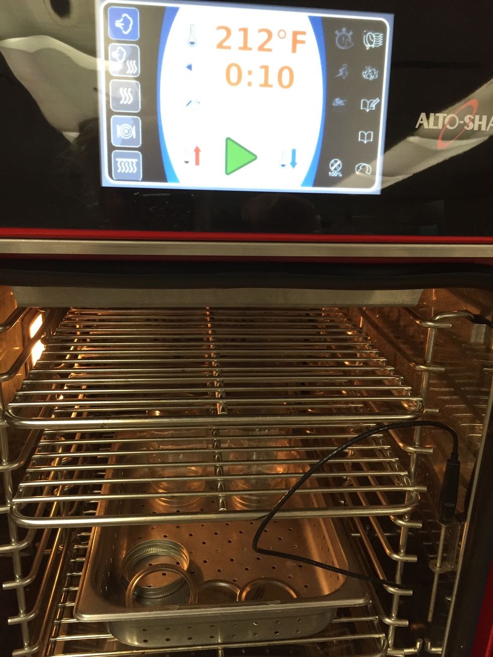 Sterilize canning jars in the oven in steam mode 212F (100C) for 10 minutes.