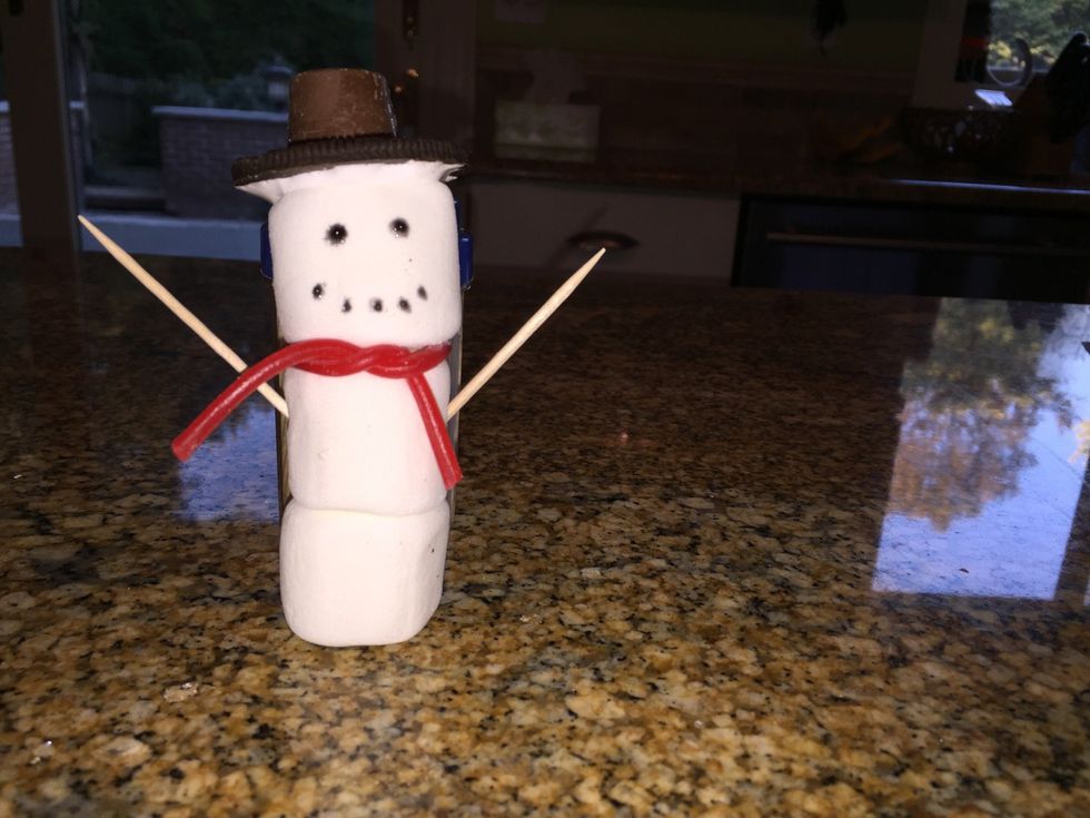 Stick 2 toothpicks on opposite sides of marshmallow #2 to make arms.