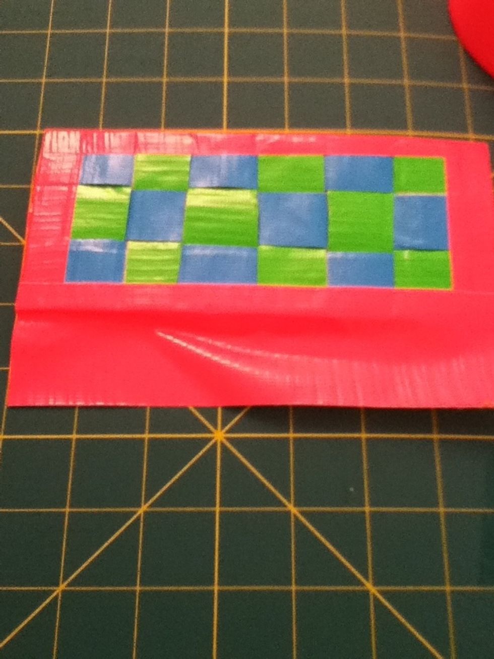Stick a piece of pink tape on only the bottom like this.