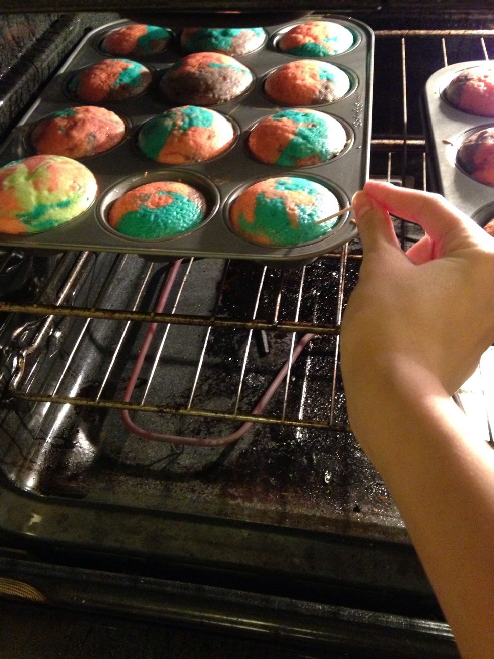 Stick a toothpick in , if the toothpick comes out clean then its cooked .