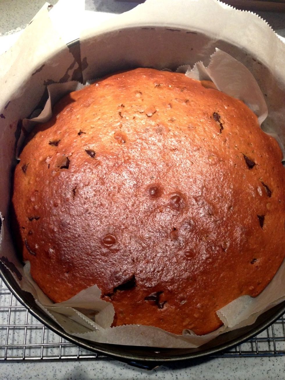 Stick a toothpick into the cake & check if it's fully cooked. The melted chocolate will stick slightly onto the pick when it's removed from the cake. Set cool.