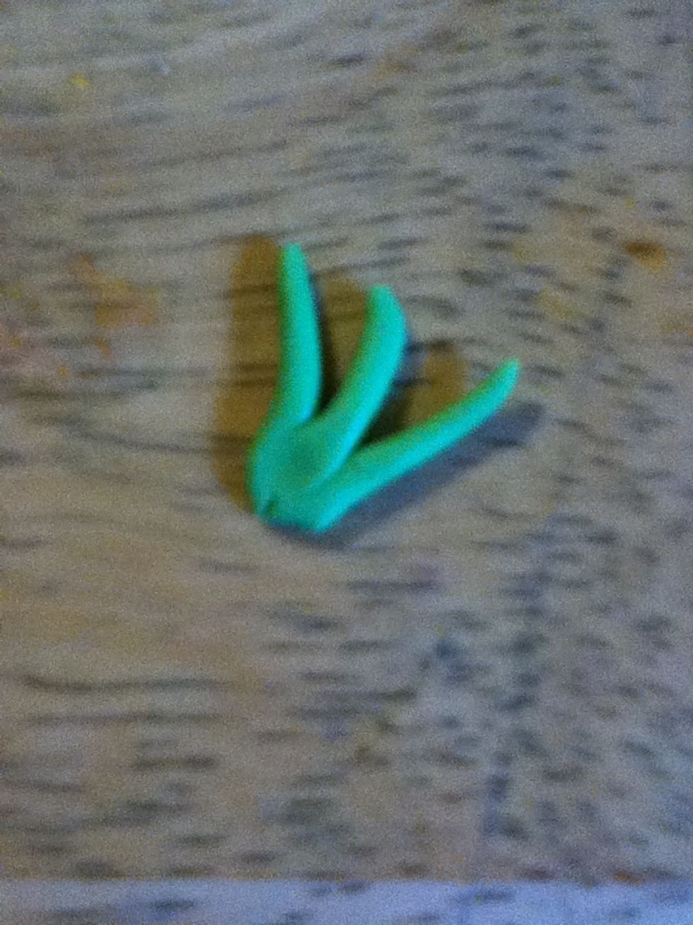 Stick all three green things together.