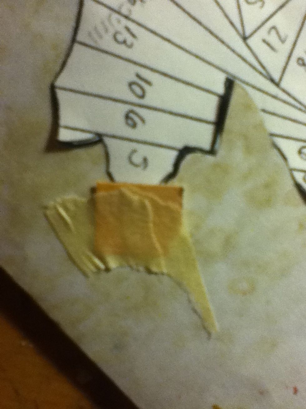 Stick down the next colour on number four, don't forget to have the folded edge facing the 'Iris'