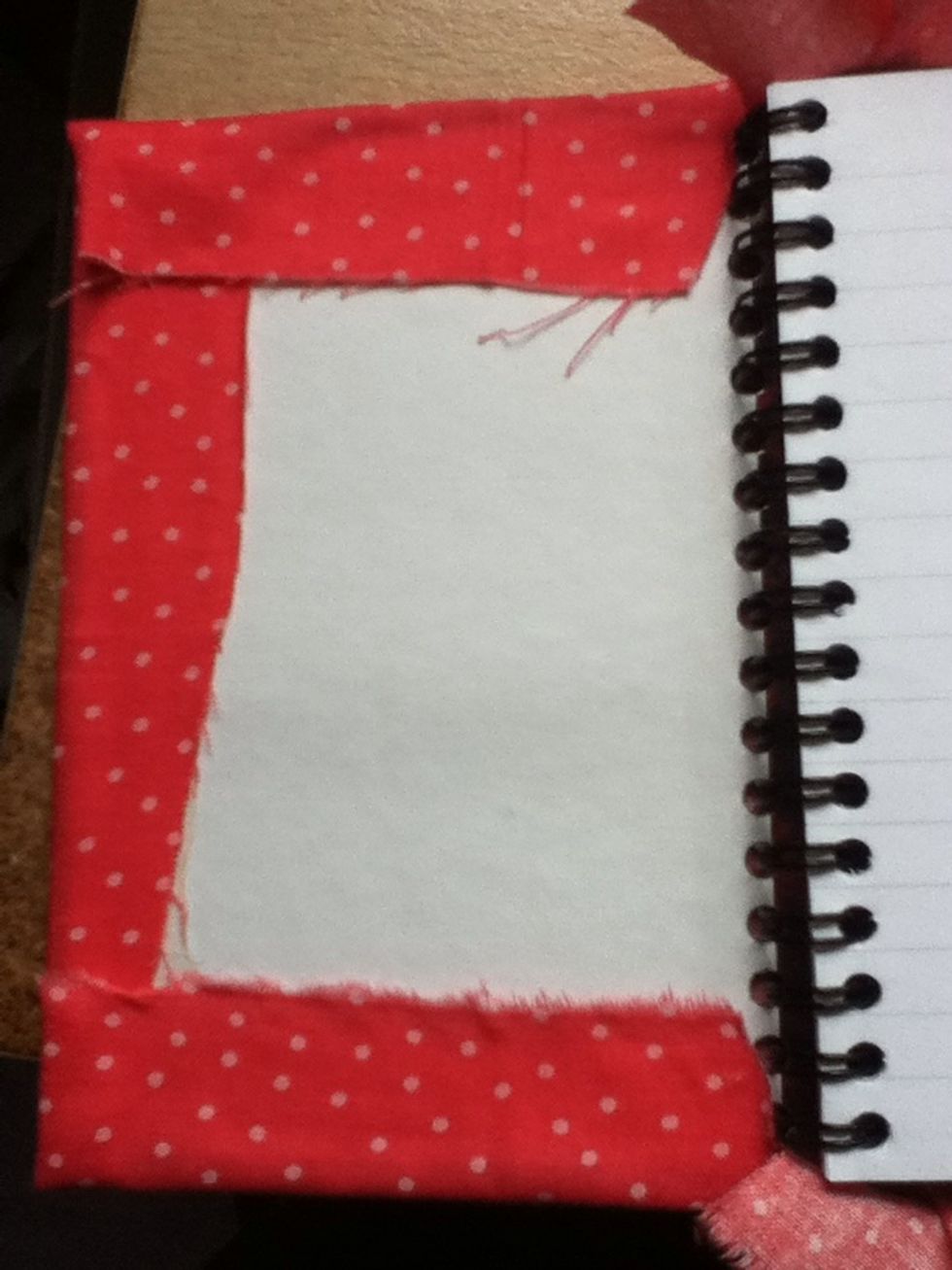 Stick down the other two sides. Repeat this on the other side of the notepad.