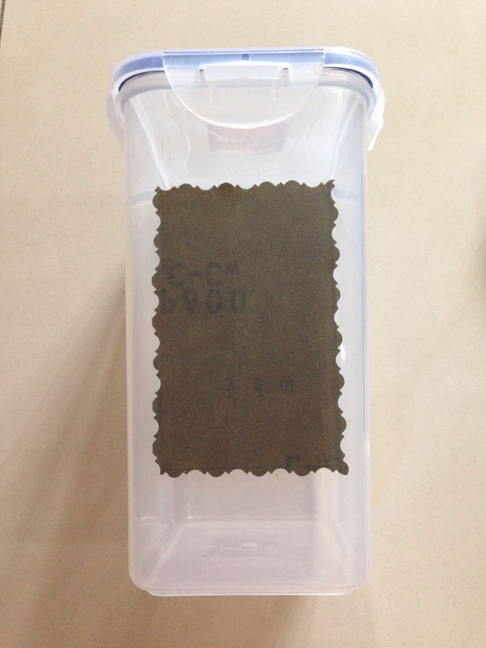 Stick it to the container.
