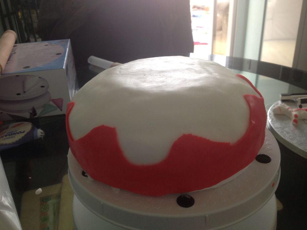 Stick on to the cake with water