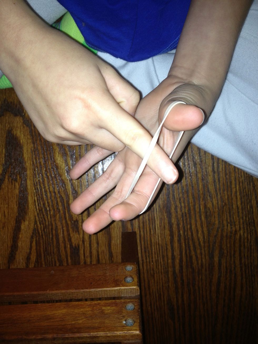 Stick other index finger in the middle