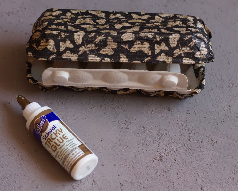 Stick paper on the box with School Tacky Glue