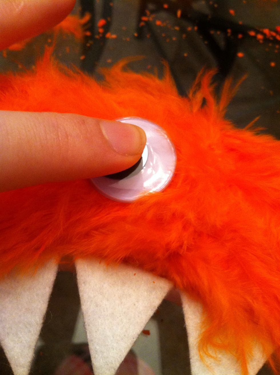 Stick the eyes on and hold them down for a few seconds.