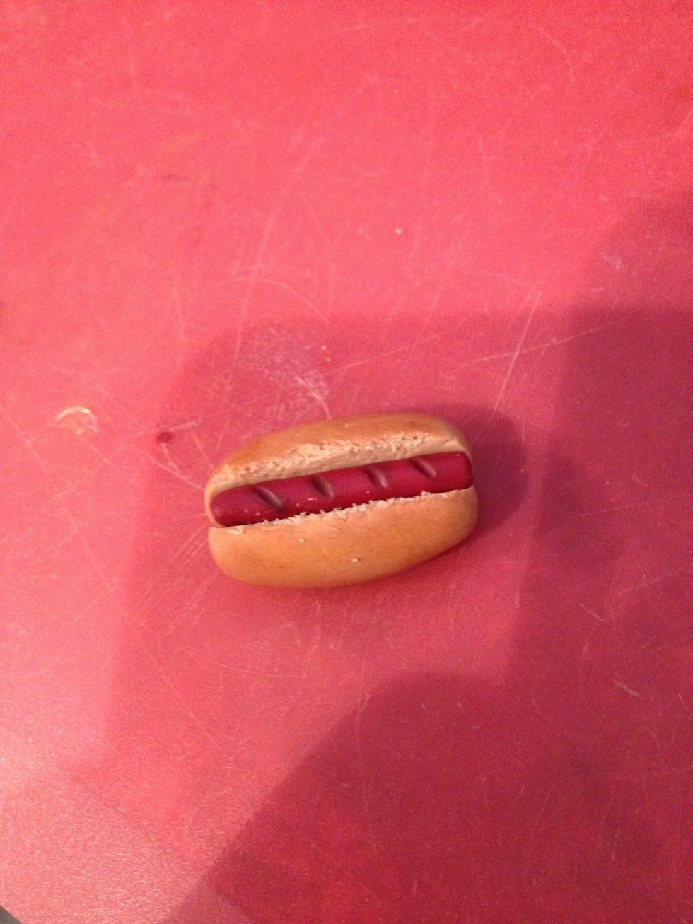 Stick the hot dog in the slice