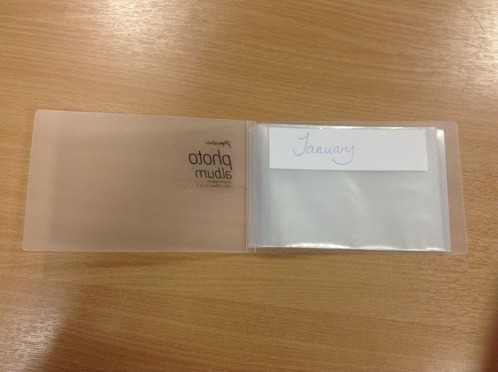 Stick the labels onto the front of the pocket so each slot has a designated month. This will make it much easier if you have to find one later on.