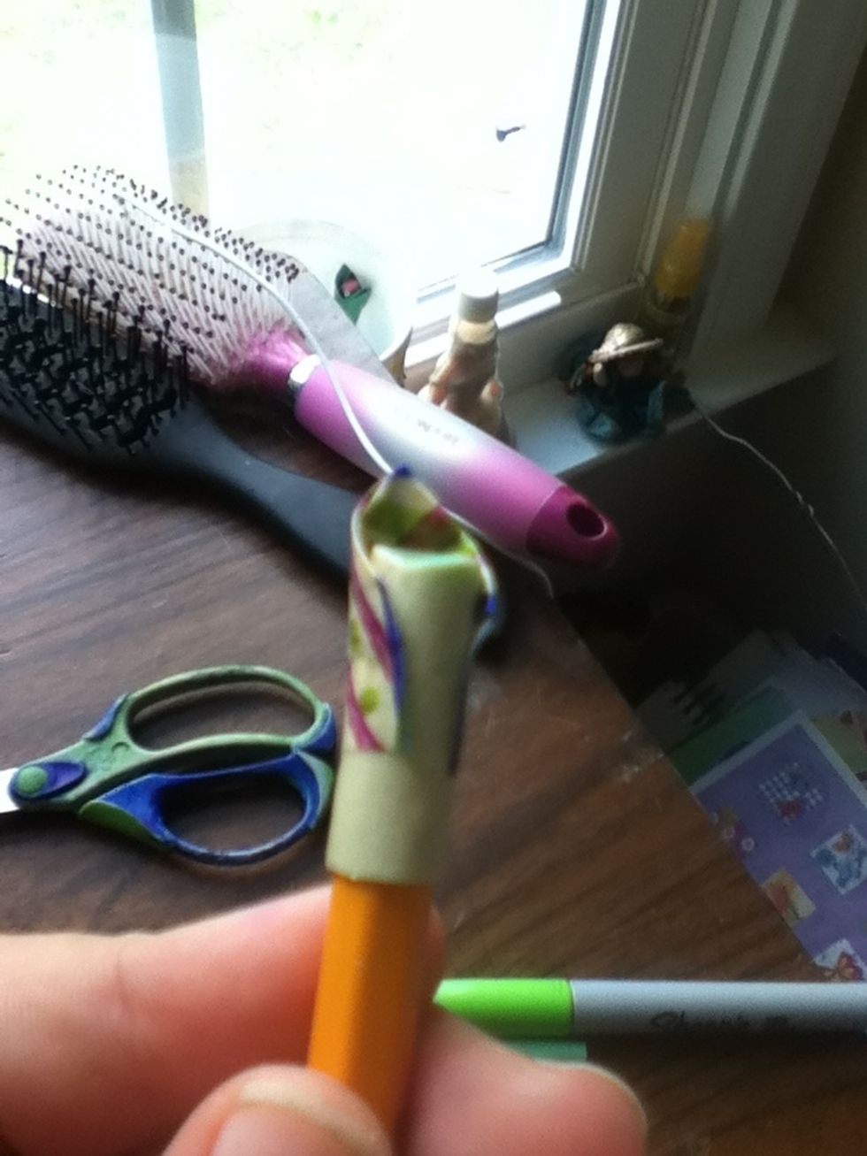 Stick the petal on the straw tube you made