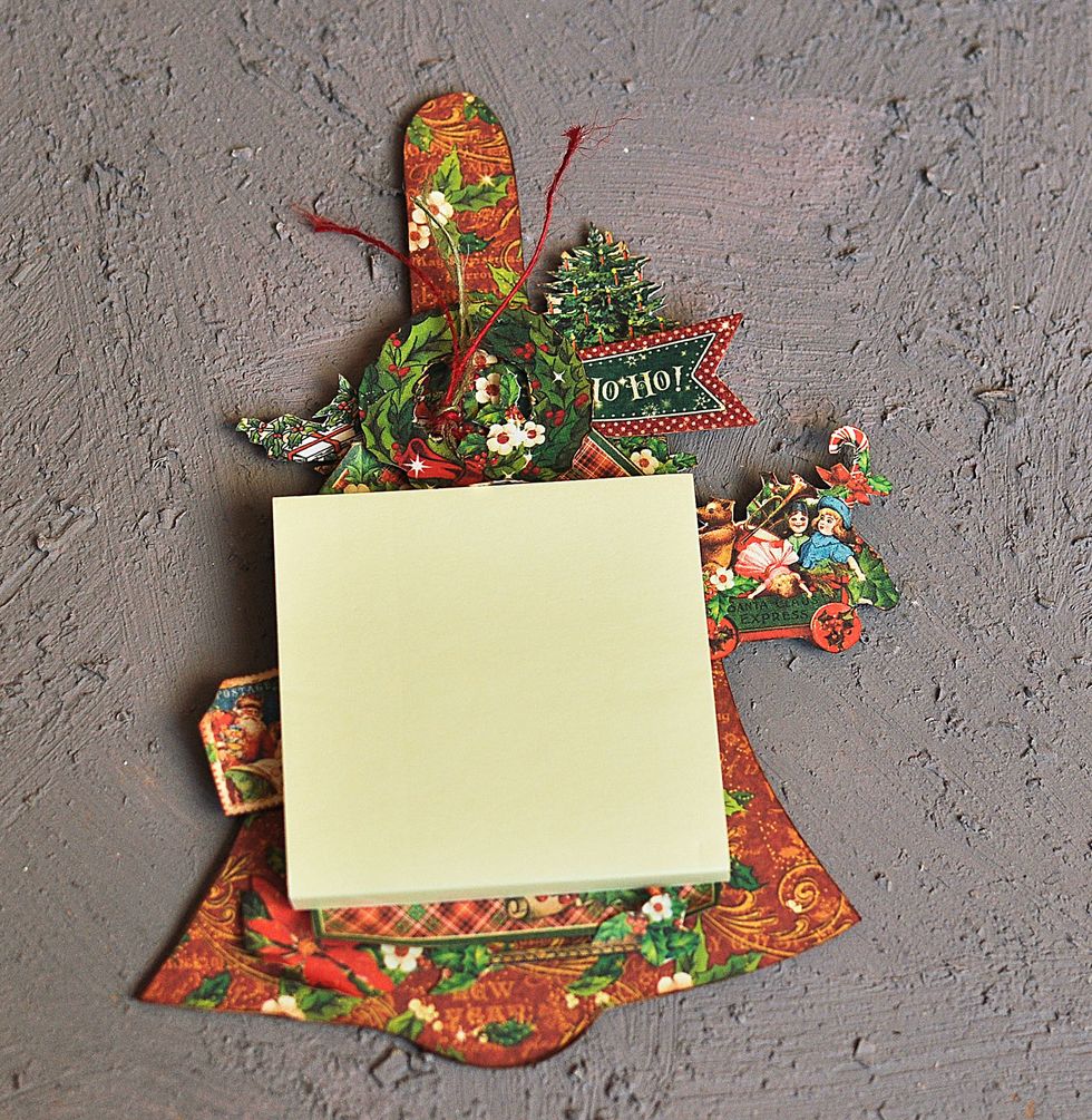 Stick the stickers notes on the bell with Mega Runner by Xyron