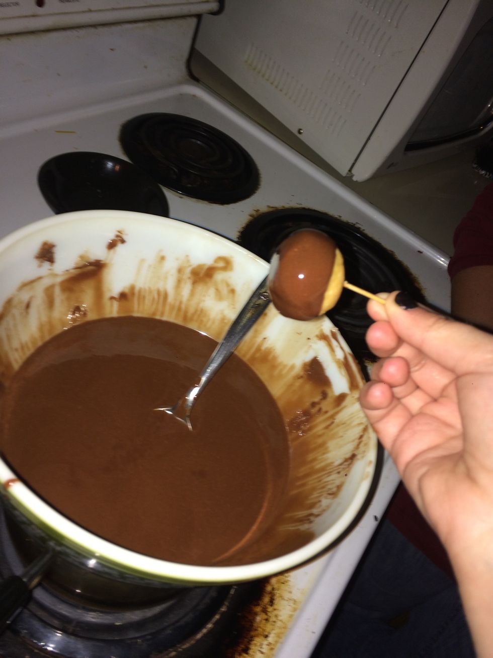 Stick the toothpicks in it and just start dipping
