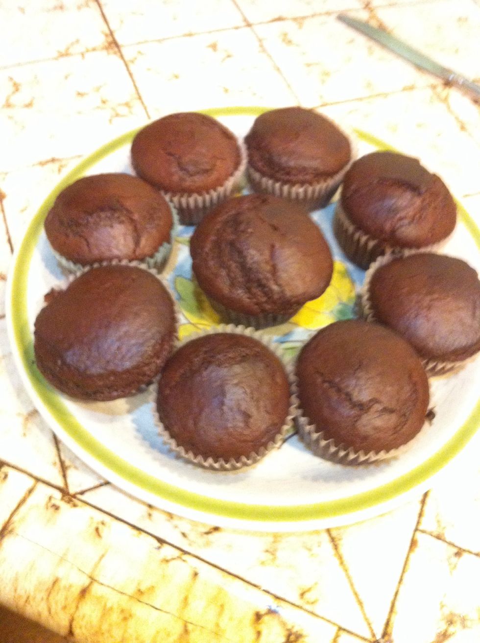 Stick the tray in the oven and bake them for around 20min, but keep an eye on them they may cook faster. If you stick something in them like a tooth pick and it comes out clean they are done.